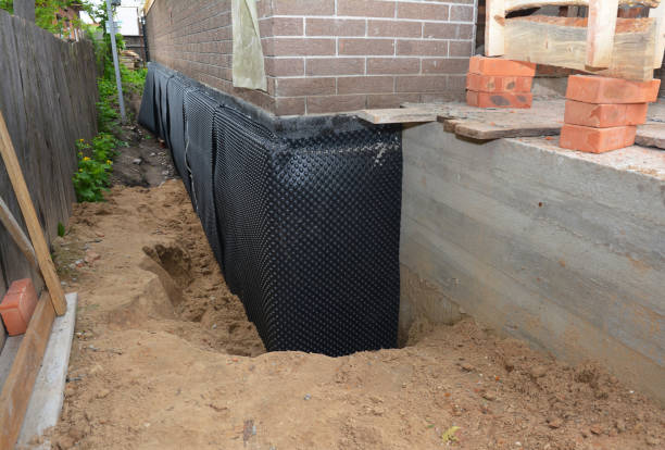 SJ Waterproofing Pros technician performing targeted Interior Drainage System assessment in Bean Station, TN